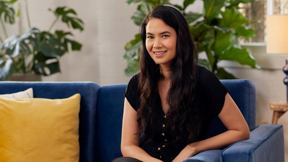Melanie Perkins,  Canva founder,  Australian entrepreneur,  women in tech,  Canva success story,  tech innovation,  startup journey,  design technology,  female CEO,  entrepreneurship in Australia